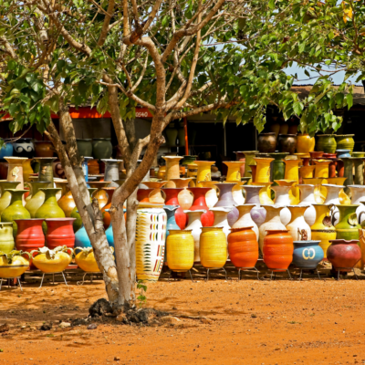 Colorful pottery at an outdoor market in Accra Ghana