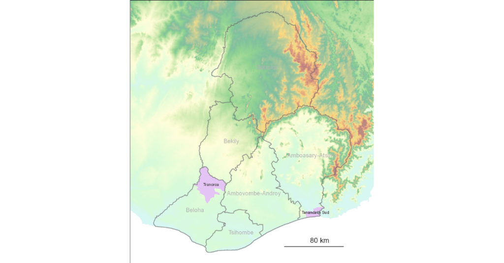 A map of southern Madagascar highlights potential local activity trial target locations. Two areas are marked in purple: Tranoroa, located in the western region near Beloha and Ambovombe-Androy, and Tanandava Sud, situated in the southeastern area close to the border of Amboasary-Atsimo. The map displays regional boundaries, topography with green flatlands and red elevated terrains, and includes a scale bar indicating a distance of 80 kilometers. Water supply in Madagascar