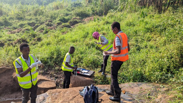 Fellows collecting water samples (Uganda)